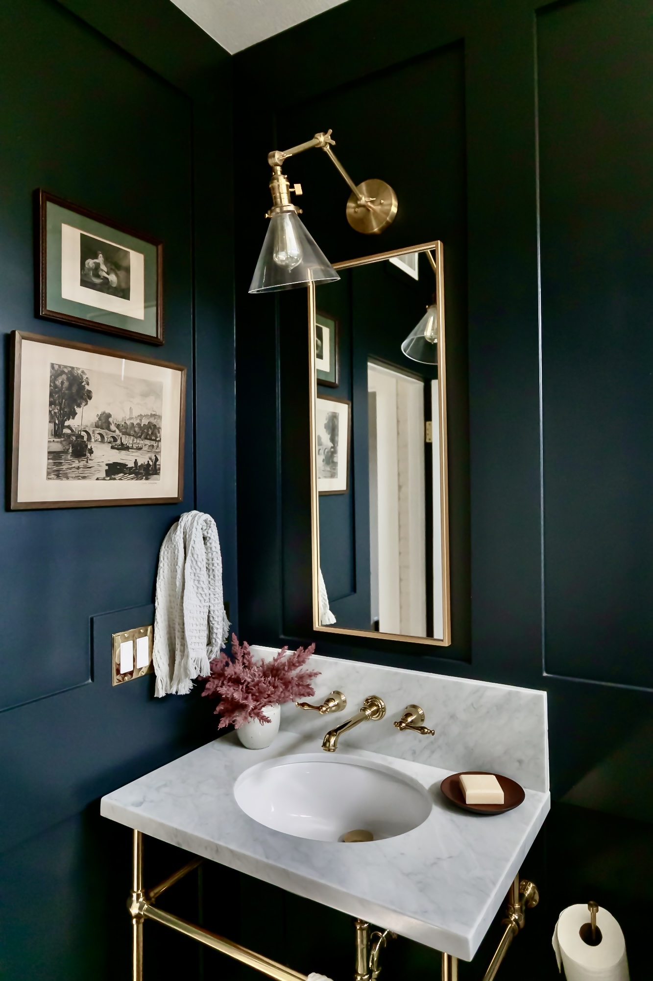 Luxury bathroom remodel with dark teal walls, marble vanity, and brass fixtures by J. Arthur Custom Homes